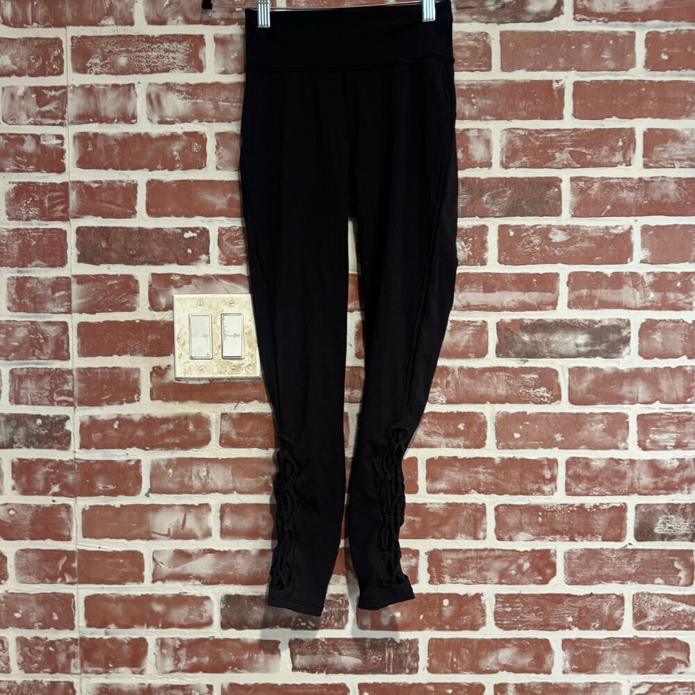 Lululemon Tied To It Tight 25” Black Leggings Size 4 EUC